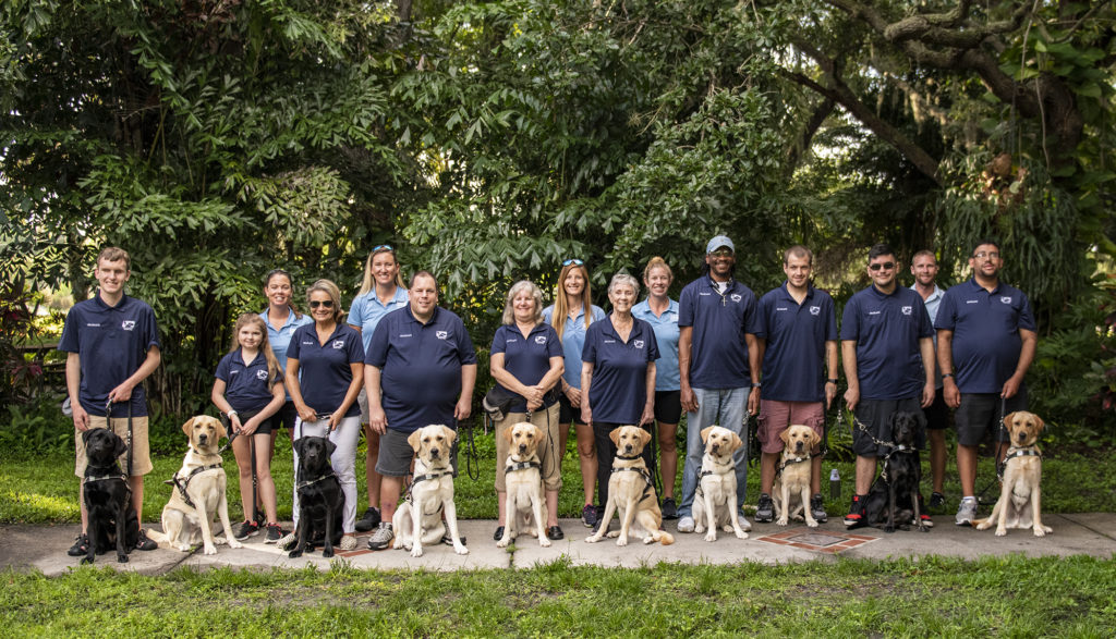 Southeastern Guide Dogs graduating class #281 standing together.